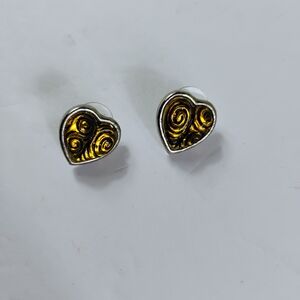 heart-shaped stud earrings featuring a yellow and silver swirl design